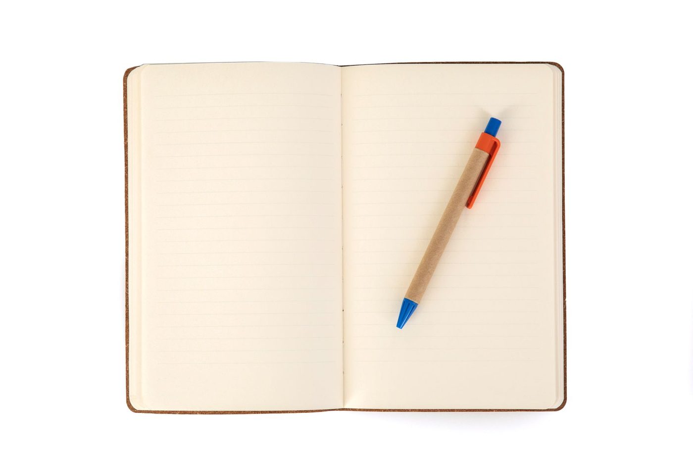 A minimalistic image featuring an open notebook with a pen placed on its pages, offering ample copy space.